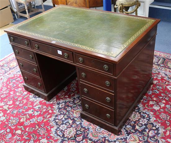 An Edwardian mahogany pedestal desk W.120cm